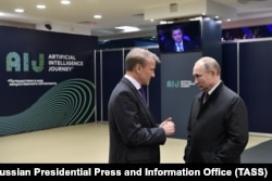 გერმან გრეფი და ვლადმირ პუტინი