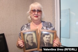Georgeta Ureche cu portretele părinților deportați