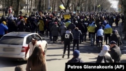 Мітинг проти російської окупації у Херсоні 13 березня 2022 року