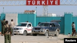 На границе Сирии и Турции. 25 июня 2015 года. 