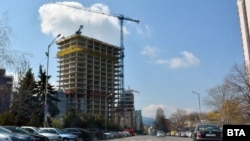 Is the uncompleted tower the symbol of a "golden age" -- or political corruption?