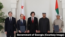 თორნიკე რიჟვაძე, ლევან დავითაშვილი, ირაკლი კობახიძე, შეიხი მუჰამედ ბინ ზაიედ ალ-ნაჰიანი და მუჰამედ ალი ალაბარი