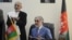 Afghan President Ashraf Ghani (L) and Abdullah Abdullah.