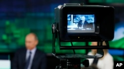 Ruski predsednik Vladimir Putin u sedištu televizijskog kanala Russia Today (Rusija danas) u Moskvi, jun 2013.