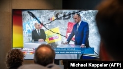 Олаф Шольц и Фридрих Мерц