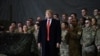 US President Donald Trump speaks to the troops during a surprise Thanksgiving day visit at Bagram airbase in 2019. 