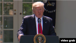 Президент США Дональд Трамп во время выступления на территории Белого дома, когда он заявил о выходе Соединенных Штатов из Парижского соглашения. Вашингтон, 1 июня 2017 года.