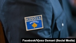 Flamuri i Kosovës në një uniformë ushtarake.