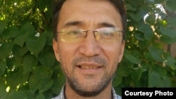 Хатем Календер. 