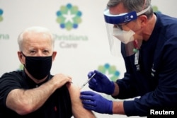 U.S. President-elect Joe Biden receives his second dose of the Pfizer-BioNTech vaccine against COVID-19 in Delaware on January 11. A number of Western leaders have been among the first to receive vaccines in an effort to instill public confidence.