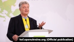 Petro Poroshenko delivers a speech at a forum in Kyiv on June 11.