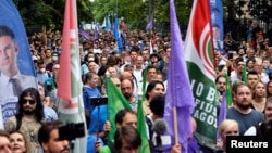 The protesters marched to the headquarters of Prime Minister Viktor Orban's governing Fidesz party, with some chanting "Victator!"