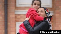 Ажигова Iайша шен ненаца Евлоева Лидияца.