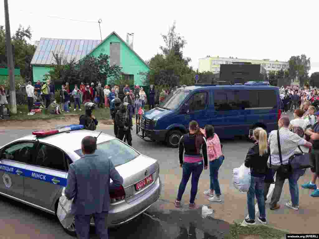 Relatives of detainees gather outside a prison in Minsk on August 12.