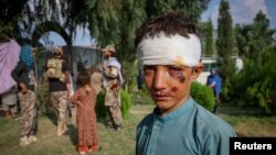 زلزله کې ټپي ماشوم