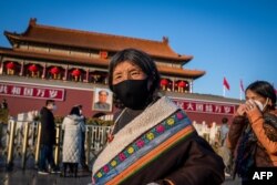 Тибетцы в Пекине. Февраль 2020 года.