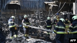 Розбір завалів на місці російського удару по «Епіцентру» в Харкові, 26 травня 2024 року