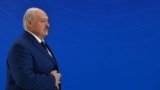 Belarus' President Alexander Lukashenko arrives to pose for a family photo prior to a meeting of the Collective Security Treaty Organisation (CSTO) Heads of State Council at the Yntymak Ordo (Palace of Unity) presidential residence in Bishkek on November 