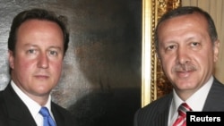 British Prime Minister David Cameron (left) meets with Turkish counterpart Recep Tayyip Erdogan in Ankara.