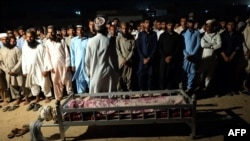 Locals from Gwadar attend the funeral for a victim of the August 20 attack claimed by the Balochistan Liberation Army (BLA).