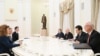 In this pool photograph distributed by the Russian state agency Sputnik, Russia's President Vladimir Putin, accompanied by Kremlin economic envoy Kirill Dmitriev and Kremlin aide Yuri Ushakov, meets with US special envoy Steve Witkoff and US President Don