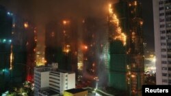 Požar u stambenom kompleksu u Hongkongu.