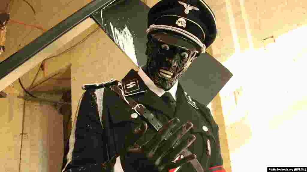 A detail from the eye-catching Nazi-themed installation&nbsp;"F**king Dinosaurs" by English brothers Jake and Dinos Chapman.&nbsp;