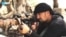 FILE: Former Tajik special forces officer Gulmurod Halimov is among the thousands of Central Asians are believed to have traveled to Iraq and Syria to fight alongside extremist groups, such as Islamic State.