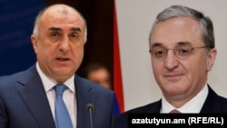Главы МИД Армении и Азербайджана - Зограб Мнацаканян (справа) и Эльмар Мамедъяров