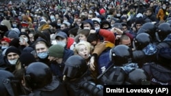 People clash with police during a rally in St.Petersburg on January 23. The fallout from the protests in late January and early February has convulsed Russia's student community.
