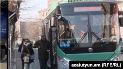 Armenia - People board a public bus in Yerevan, February 3, 2025.