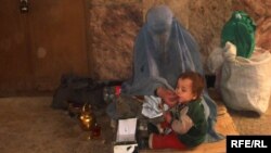 آرشیف - یک خانم گدا