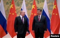 Vladimir Putin și Xi Jinping, înainte de ceremonia de deschidere a Jocurilor Olimpice