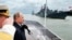 RUSSIA -- Russian President Vladimir Putin, second left, reviews a Navy parade during celebrations for Russian Navy Day, in Baltiisk, in the Kaliningrad region, during celebrations for Russian Navy Day, July 26, 2015