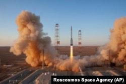 A Proton-M booster rocket carrying the Nauka module blasts off from the launch pad at Russia's space facility in Baikonur on July 21.