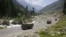 Indian army trucks move along a highway leading to Ladakh in India-administered Kashmir. (file photo)
