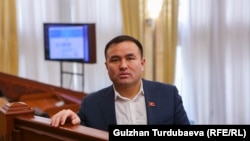 Алишер Козуев, Жогорку Кеңештин депутаты.