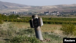 An unexploded rocket shell is seen near the town of Martuni in Nagorno-Karabakh on October 14.