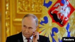 Президент Росії Володимир Путін зустрівся зі своєю передвиборчою командою в Москві 20 березня