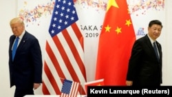 US President Donald Trump (left) and his Chinese counterpart, Xi Jinping (file photo 2019)