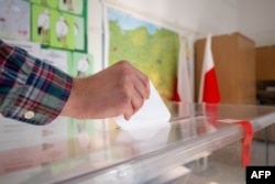 21 de milioane de polonezi au votat la turul doi de scrutin al alegerilor prezidențiale. A fost o prezență la urne record, de 71,63%.