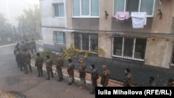 Soldiers vote at a polling station in Chisinau on November 15.
