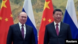 پوتین هڅه کوي له چین سره خپل اړیکي پراخ کړي