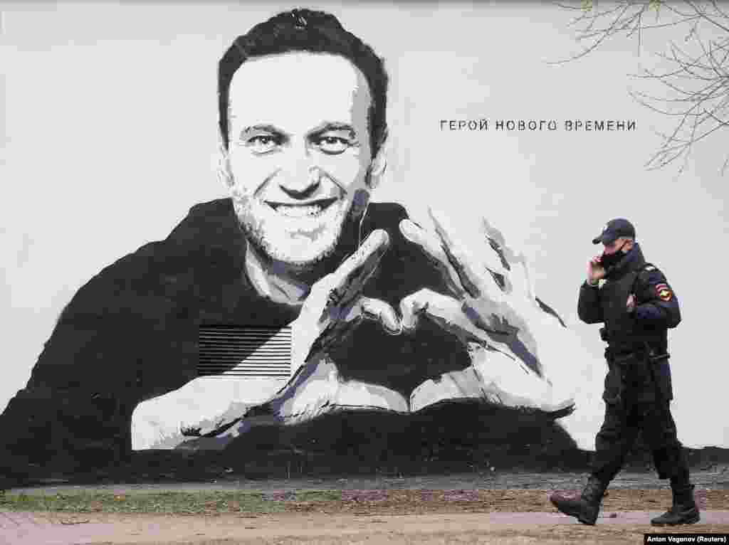 It only took a few hours before police in President Vladimir Putin's hometown arrived and the authorities ordered that it be painted over.