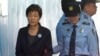 SOUTH KOREA --  In this Oct. 10, 2017, file photo, former South Korean President Park Geun-hye, left, arrives to attend a hearing on the extension of her detention at the Seoul Central District Court in Seoul, South Korea.