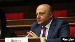 Armenia - Artur Sarkisian, a parliament deputy from the opposition Hayastan alliance.