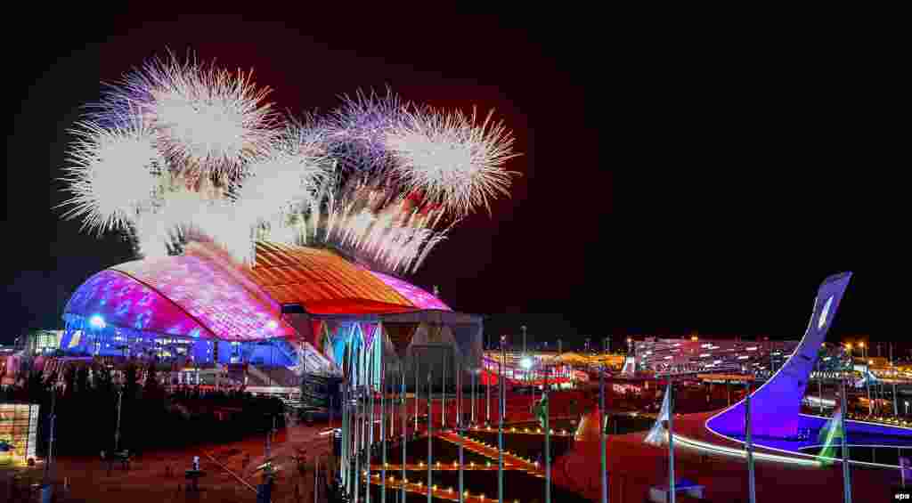 Fireworks go off over the Fisht Olympic Stadium at the start of the opening ceremony for the Sochi Winter Olympics.