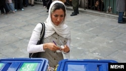 ირანელი ამომრჩეველი ხმის მიცემისას