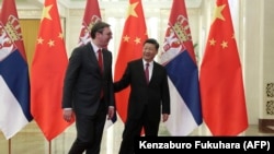Presidenti serb, Aleksandar Vuçiq, me presidentin kinez, Xi Jinping, në Pekin. Prill, 2019.