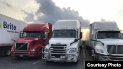 Большегрузные автомашины - траки. 